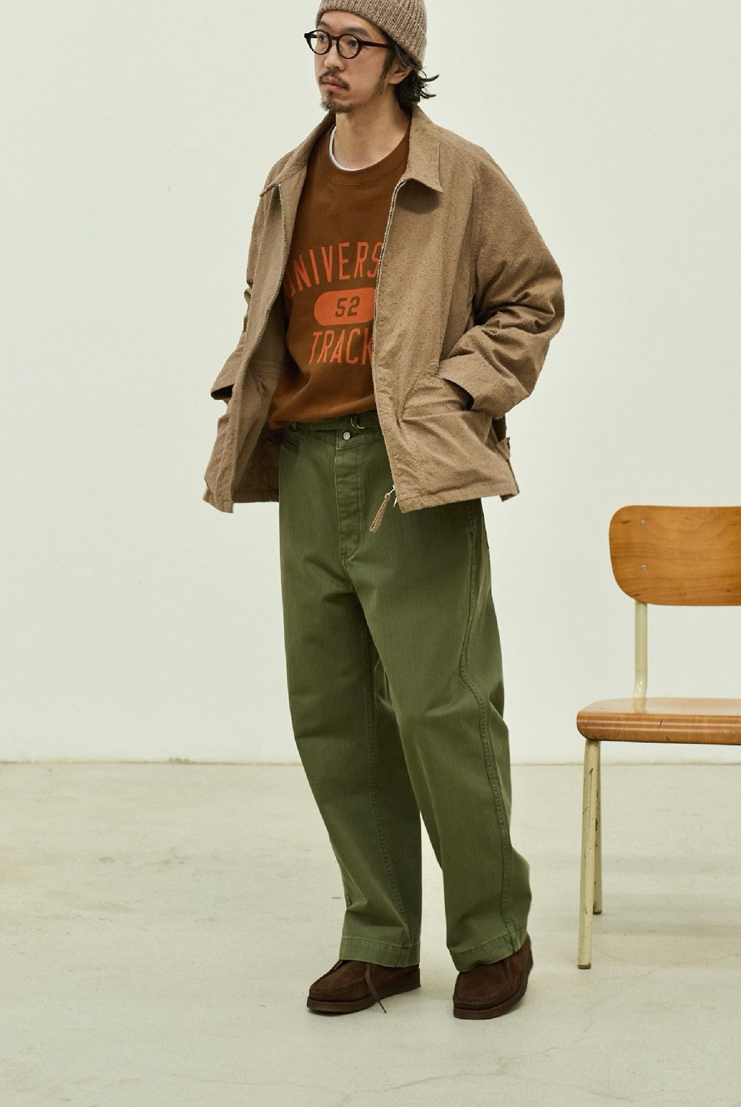 USAGE Heavyweight Herringbone Twill Belted Trousers in Olive - On Male Model
