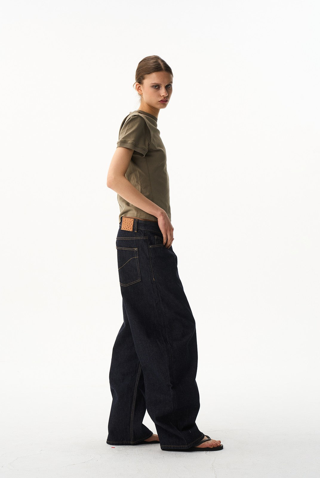 BLINDNOPLAN Curved Wide Leg Raw Denim Jeans in Denim - On Female Model
