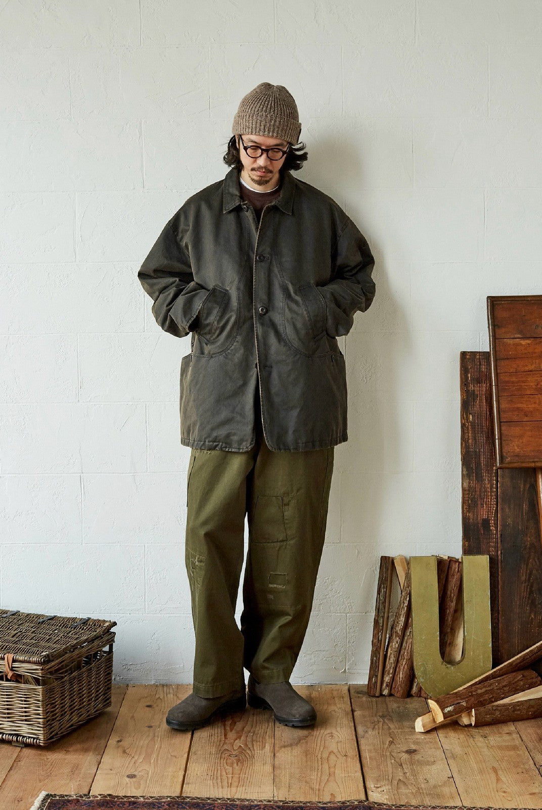 USAGE Hand Distressed Patched Chinos in Olive - On Male Model