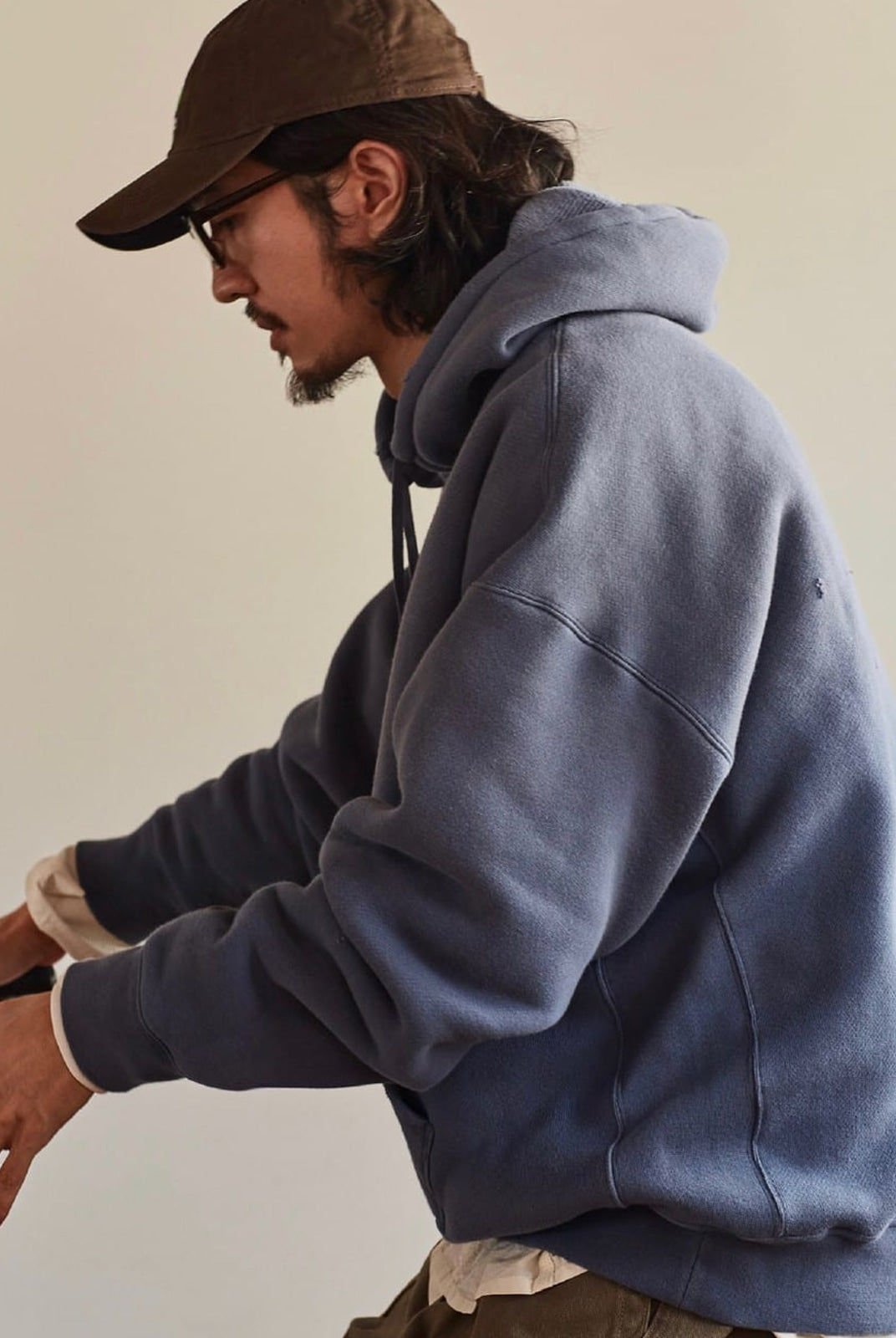 USAGE Faded Vintage Wash Hoodie in Blue - On Male Model