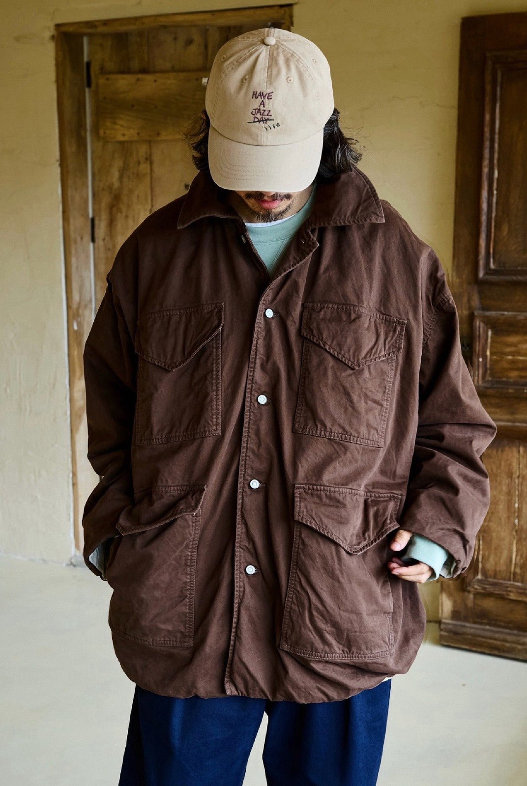 USAGE Washed Cotton Twill M65 Jacket in Brown - On Male Model