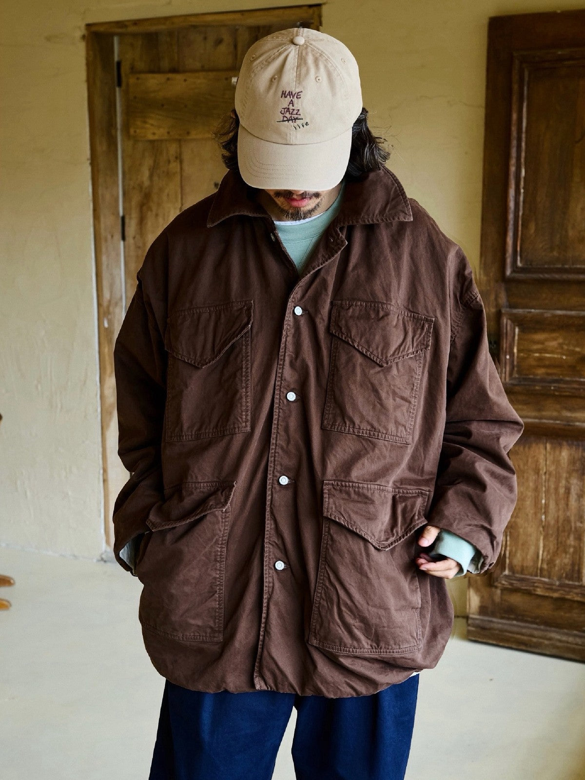 USAGE Washed Cotton Twill M65 Jacket in Brown - On Male Model