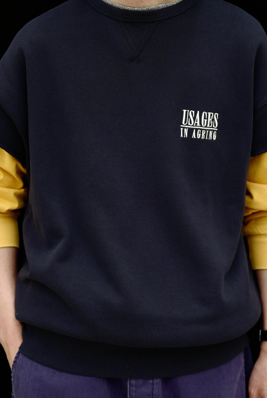 USAGE Raw Edge Cotton Short Sleeve Sweatshirt in Navy Blue - On Male Model