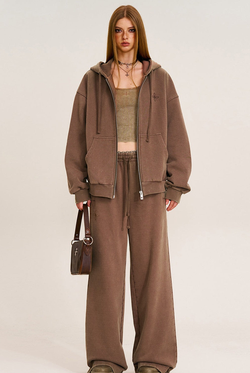 SMFK Cross Embroidered Cotton Zip Up Hoodie in Brown - On Female Model