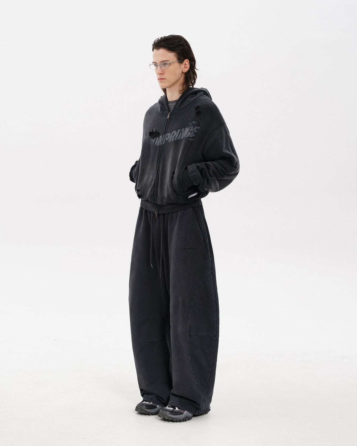 MASONPRINCE Double Layered Cotton Joggers in Black - On Male Model