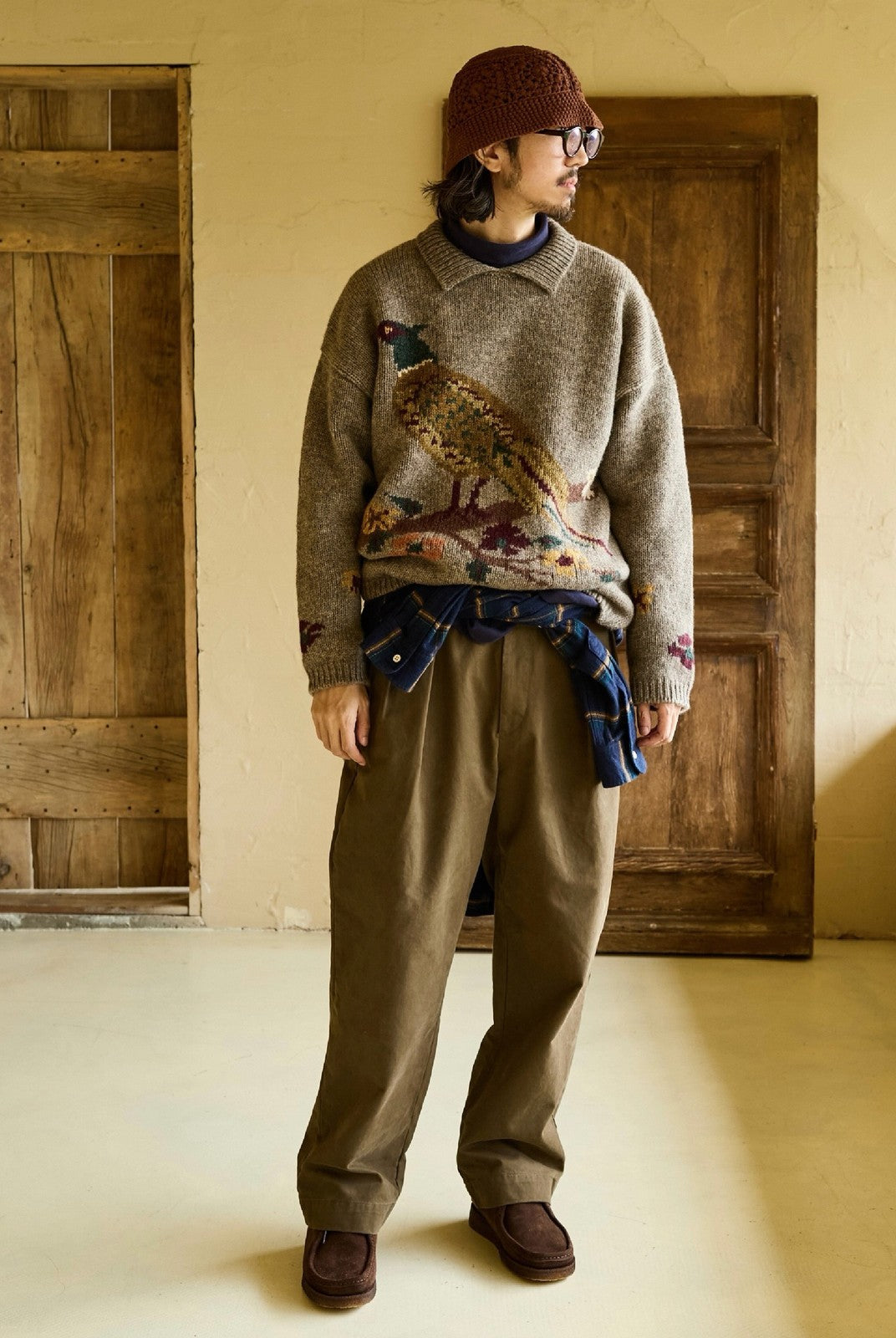 USAGE Pleated Cotton Twill Chinos in Olive - On Male Model