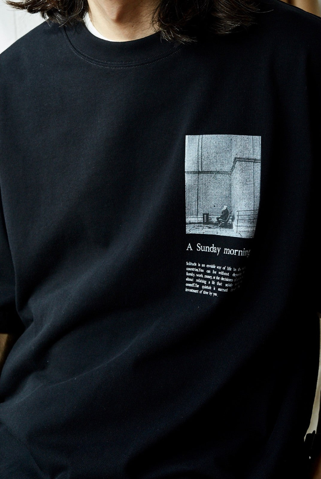 USAGE Air Spun Cotton Graphic T Shirt in Black - On Male Model