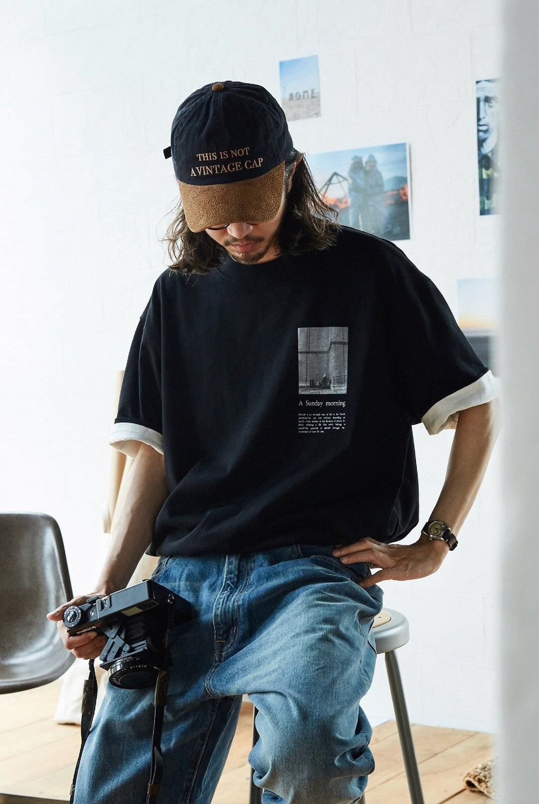 USAGE Air Spun Cotton Graphic T Shirt in Black - On Male Model