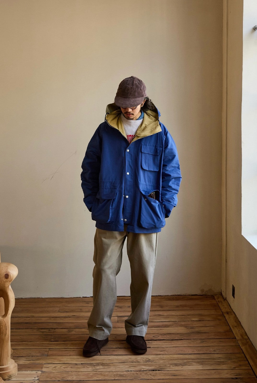 USAGE Cotton Nylon Hooded Mountain Parka in Blue - On Male Model