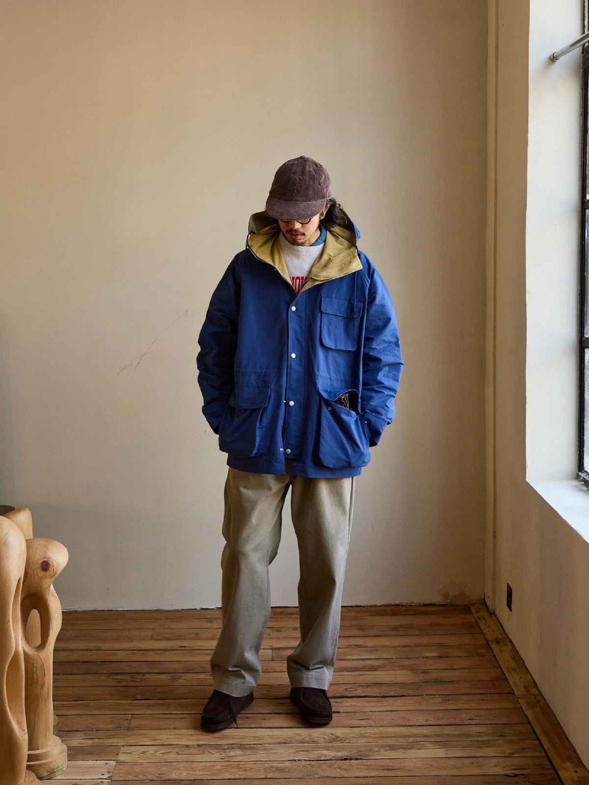 USAGE Cotton Nylon Hooded Mountain Parka in Blue - On Male Model