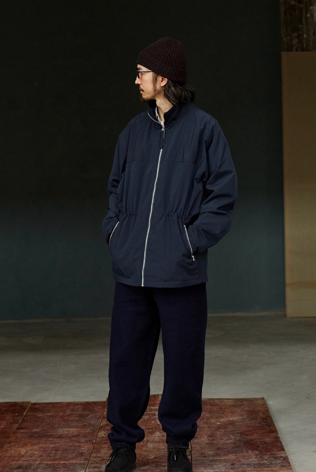 USAGE Drawstring Zip Front Tech Anorak in Navy Blue - On Male Model