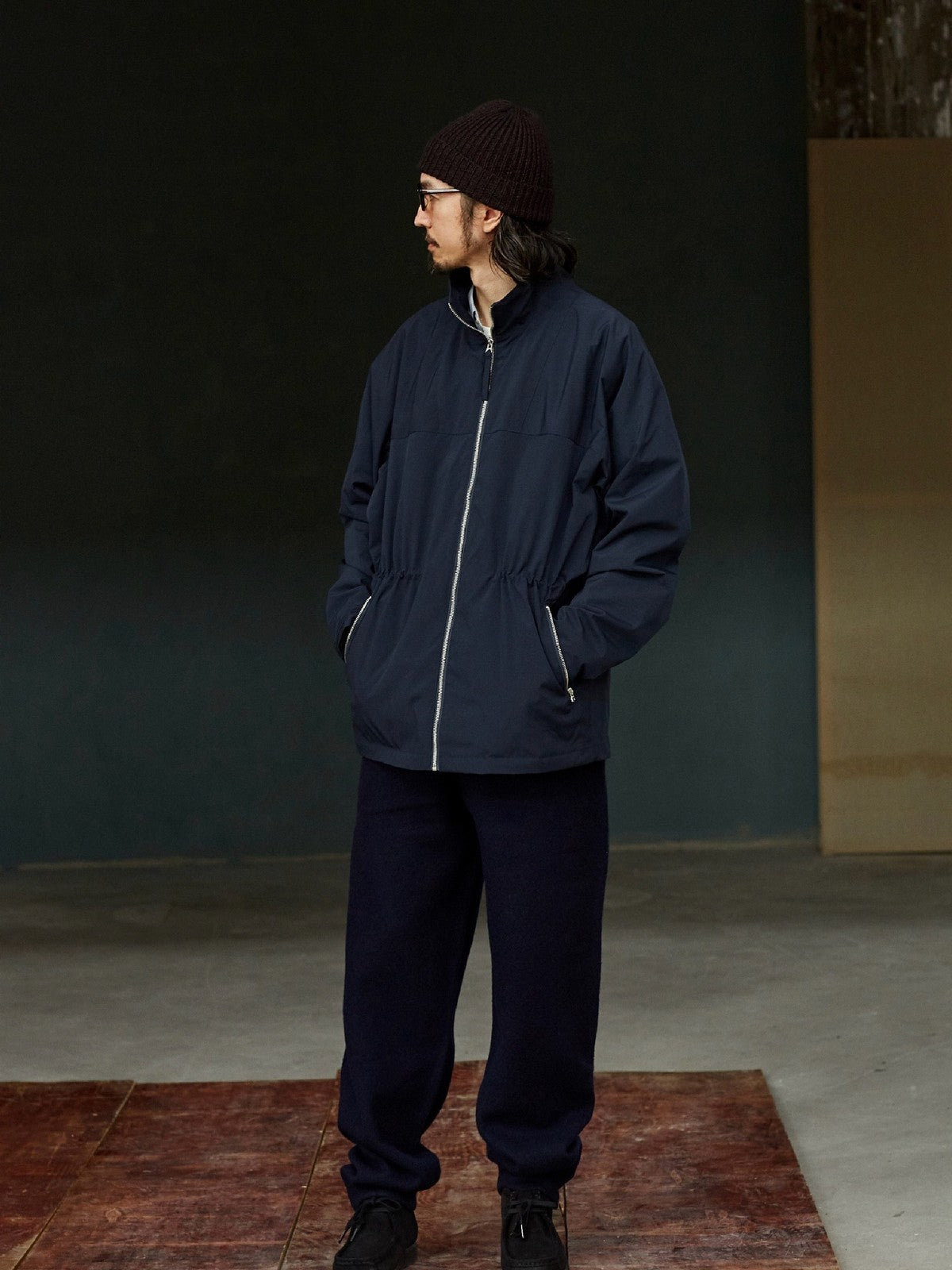 USAGE Drawstring Zip Front Tech Anorak in Navy Blue - On Male Model