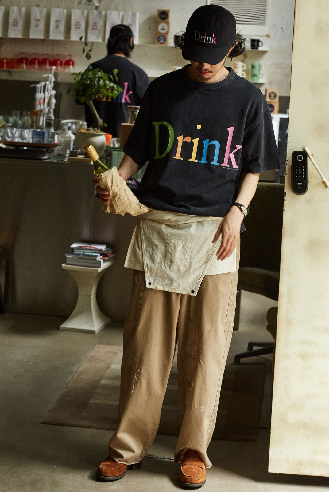 USAGE Faded Rainbow Logo T Shirt in Black - On Male Model