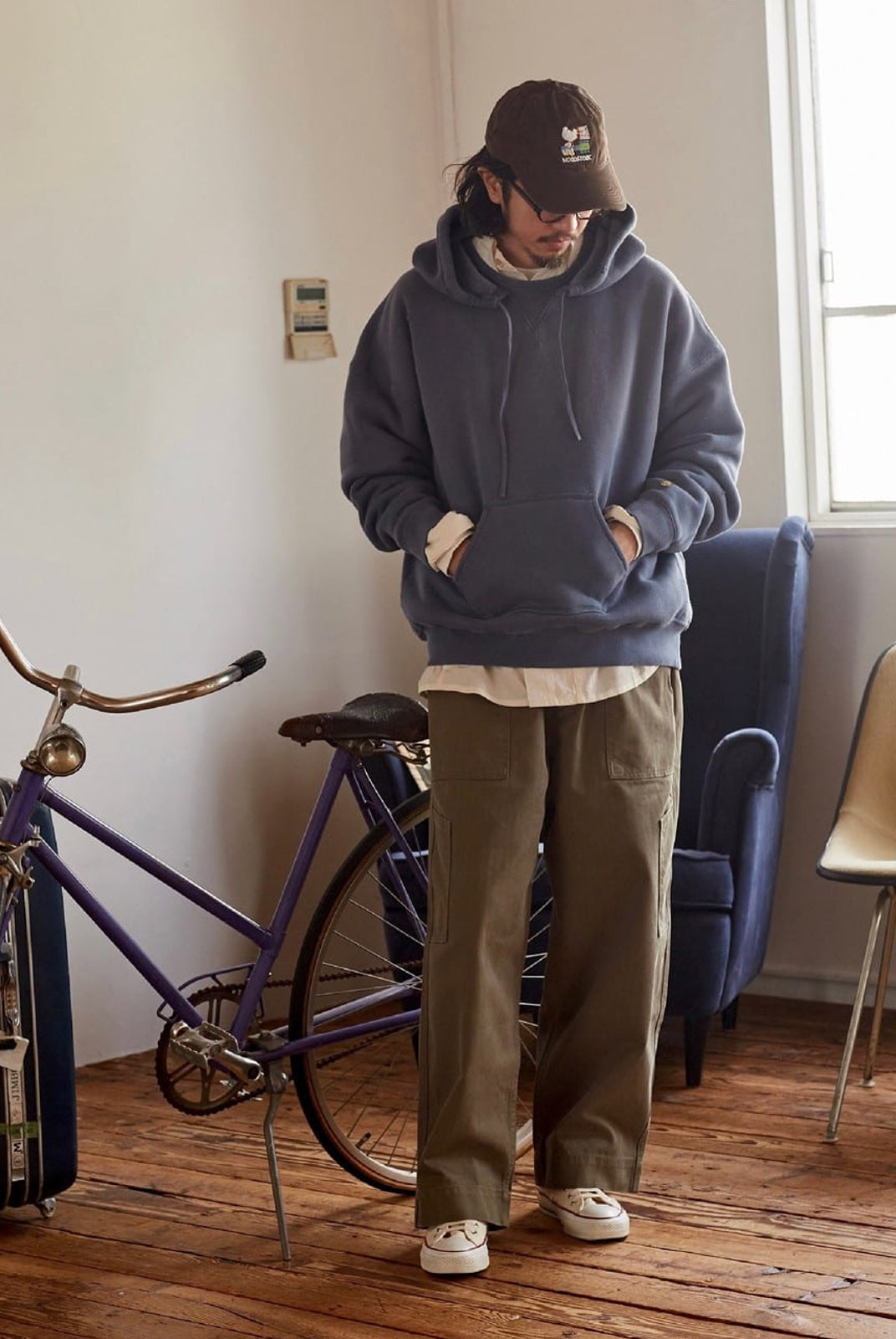 USAGE Faded Vintage Wash Hoodie in Blue - On Male Model