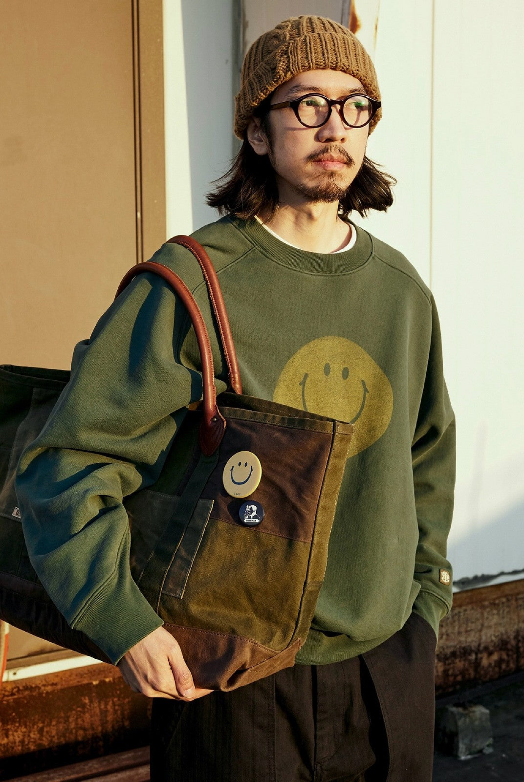 USAGE Washed Cotton Raglan Smiley Sweatshirt in Mint - On Male Model