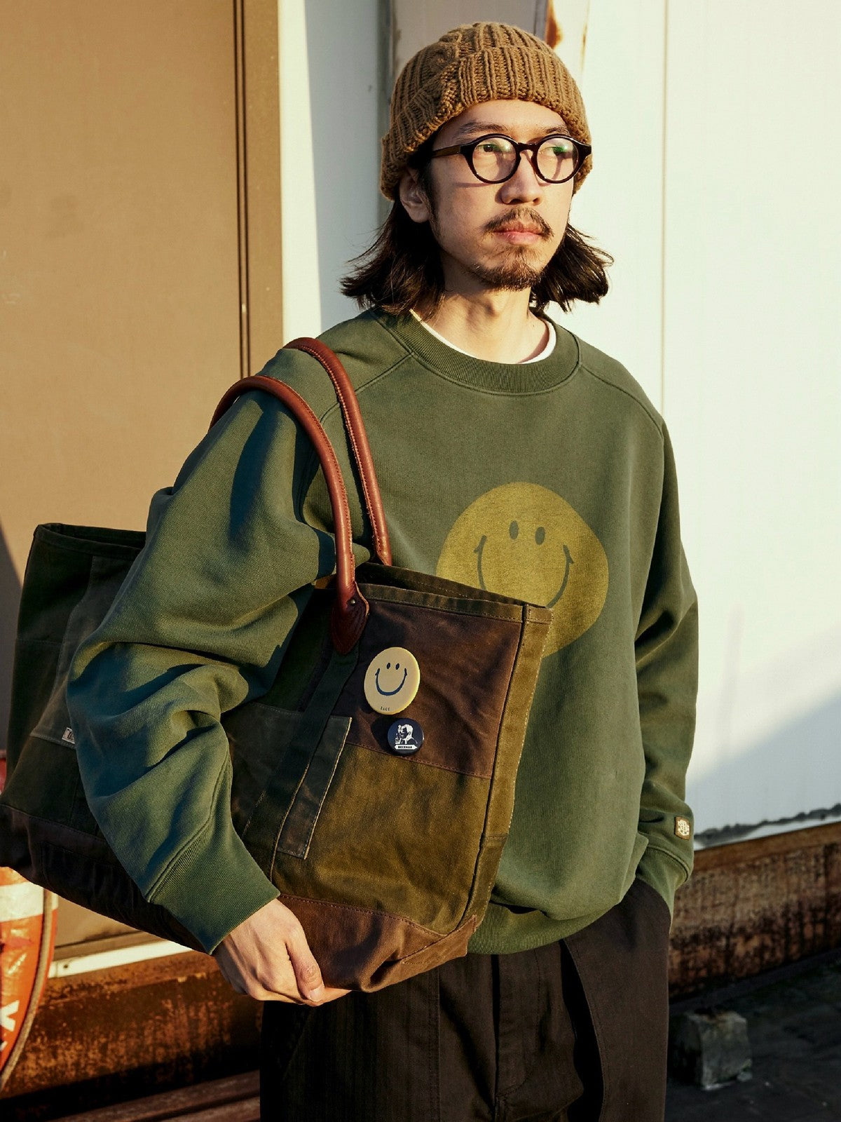 USAGE Washed Cotton Raglan Smiley Sweatshirt in Mint - On Male Model