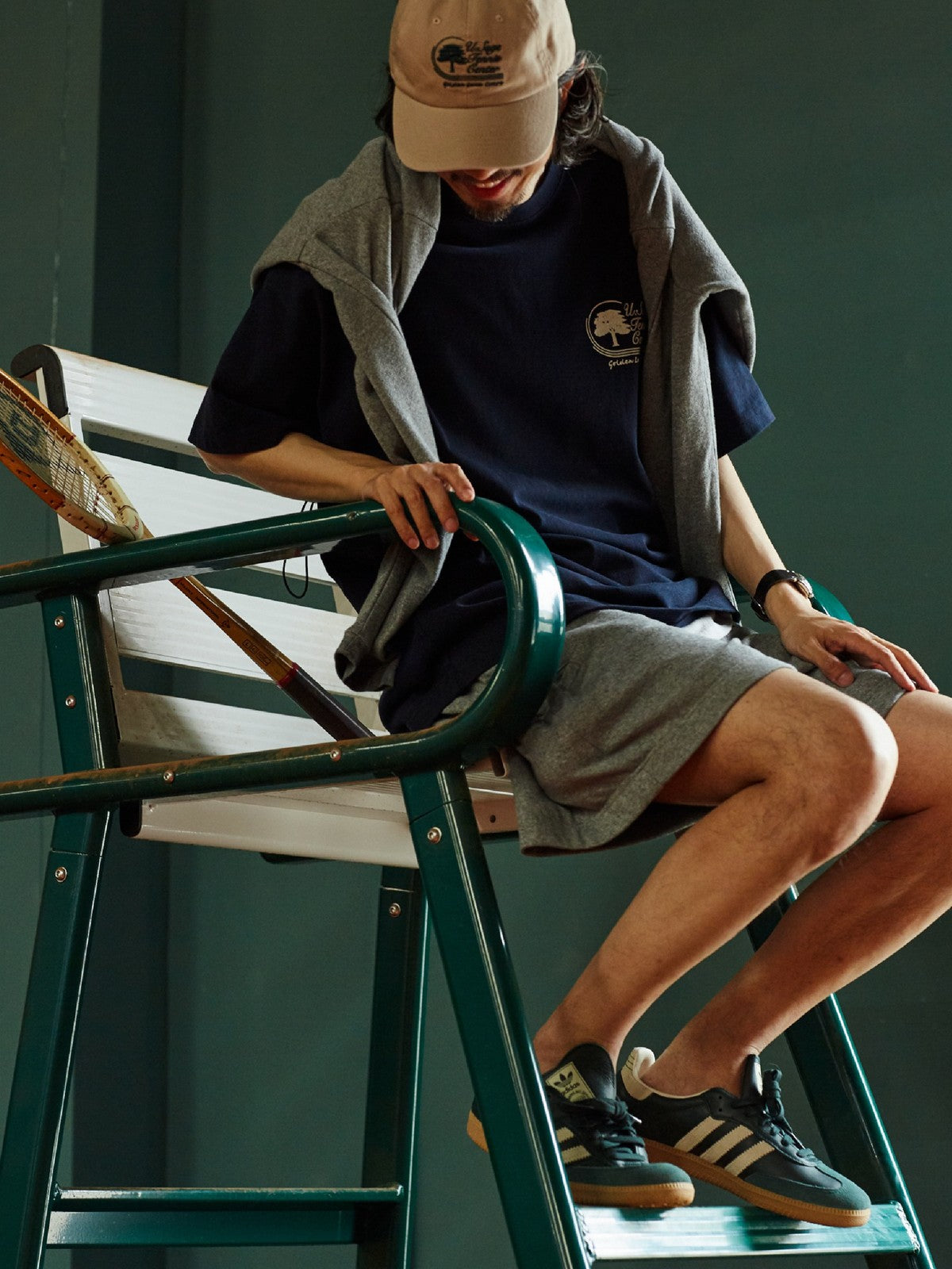 USAGE Retro Tennis Graphic Cotton T Shirt in Navy Blue - On Male Model