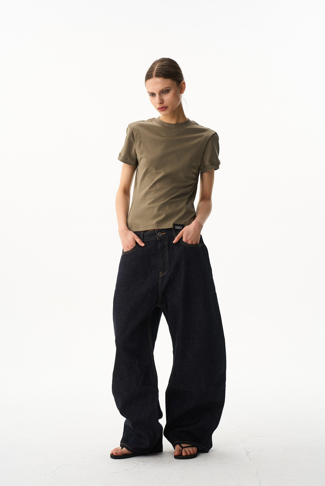 BLINDNOPLAN Curved Wide Leg Raw Denim Jeans in Denim - On Female Model