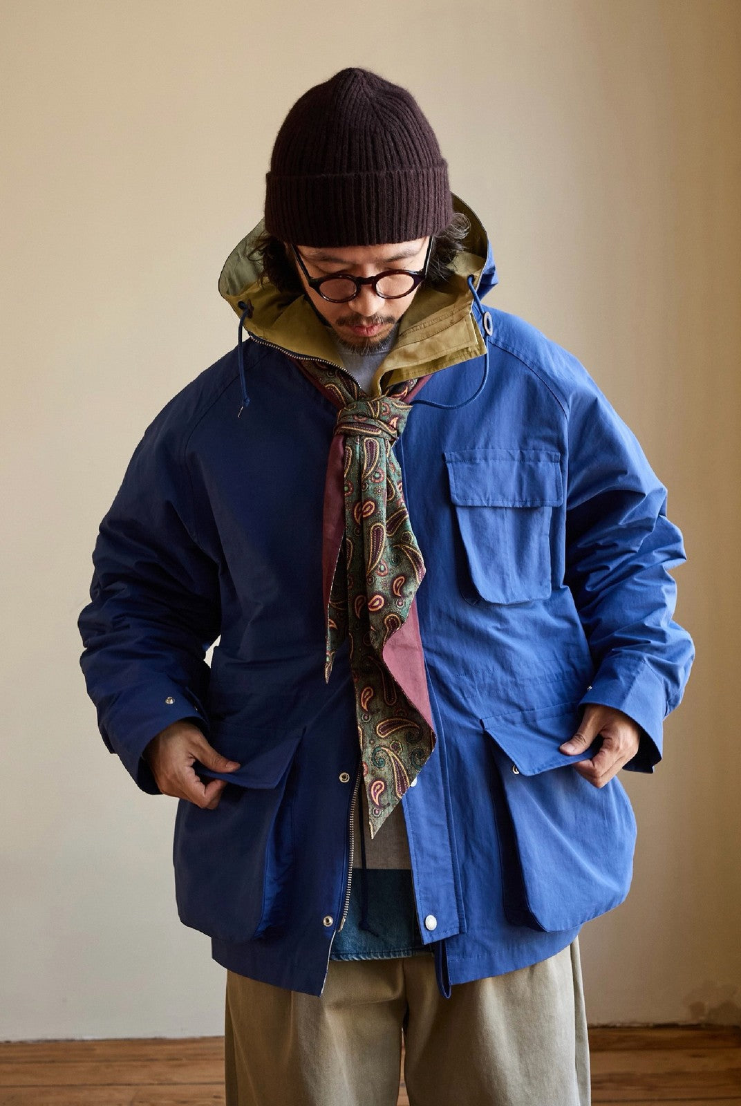 USAGE Cotton Nylon Hooded Mountain Parka in Blue - On Male Model