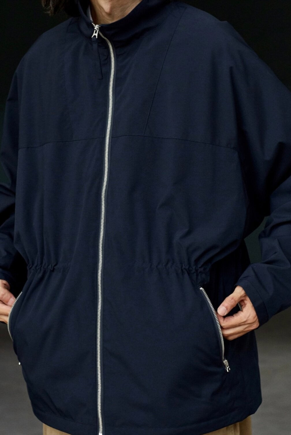 USAGE Drawstring Zip Front Tech Anorak in Navy Blue - On Male Model