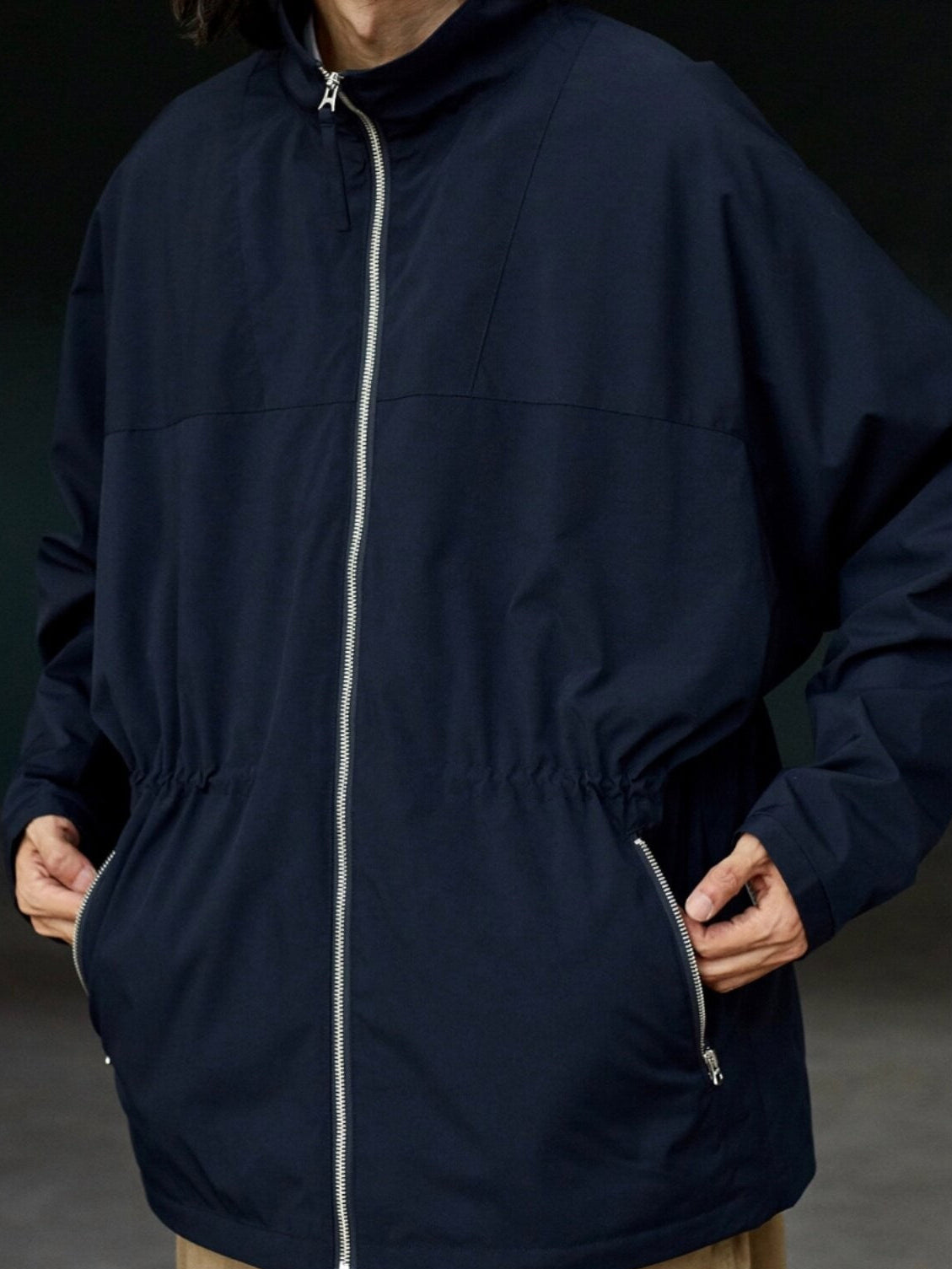 USAGE Drawstring Zip Front Tech Anorak in Navy Blue - On Male Model