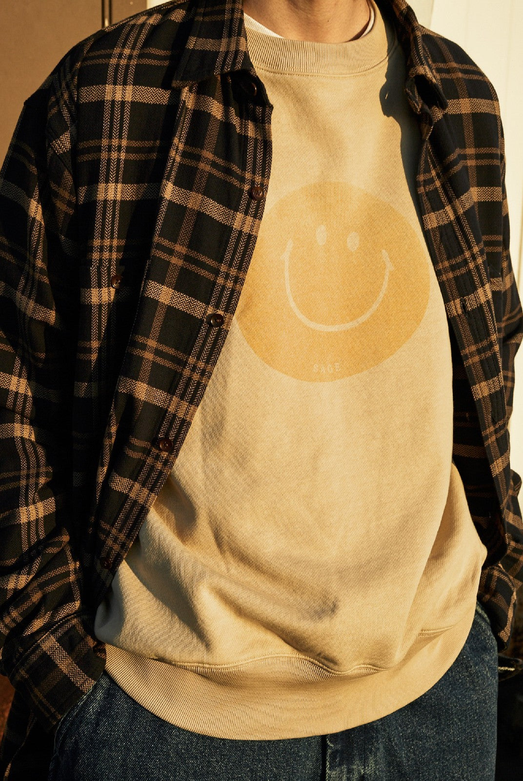 USAGE Washed Cotton Raglan Smiley Sweatshirt in Beige - On Male Model