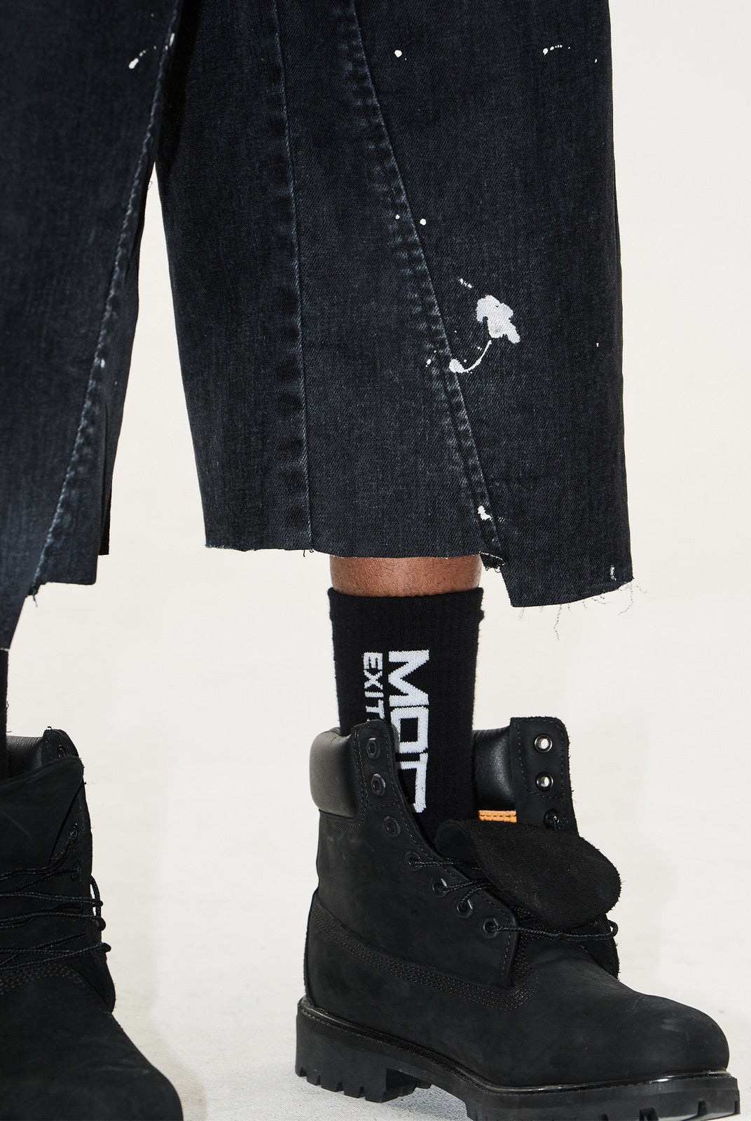 BLINDNOPLAN Ink Splatter Denim Carpenter Shorts in Black - On Model