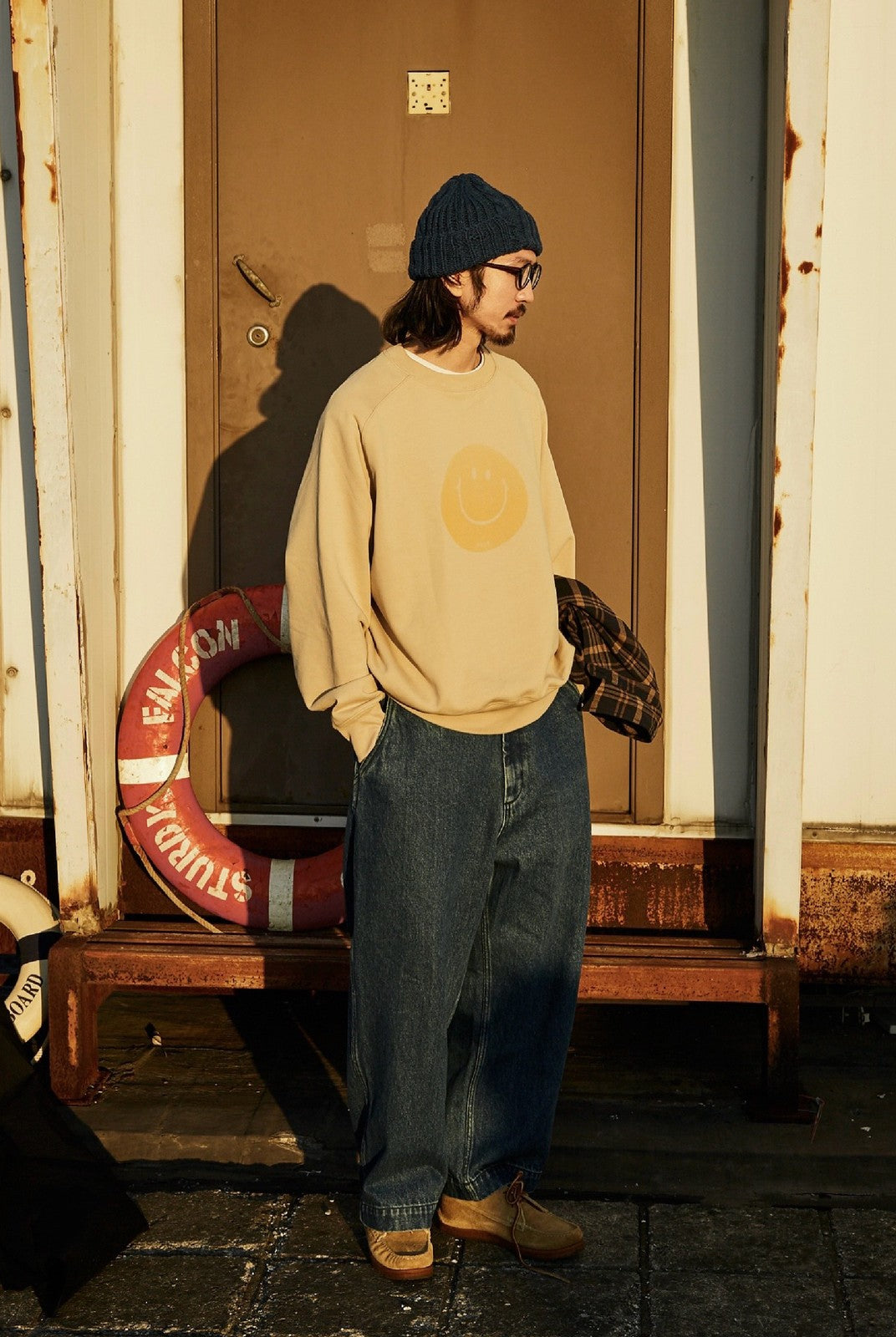USAGE Washed Cotton Raglan Smiley Sweatshirt in Beige - On Male Model