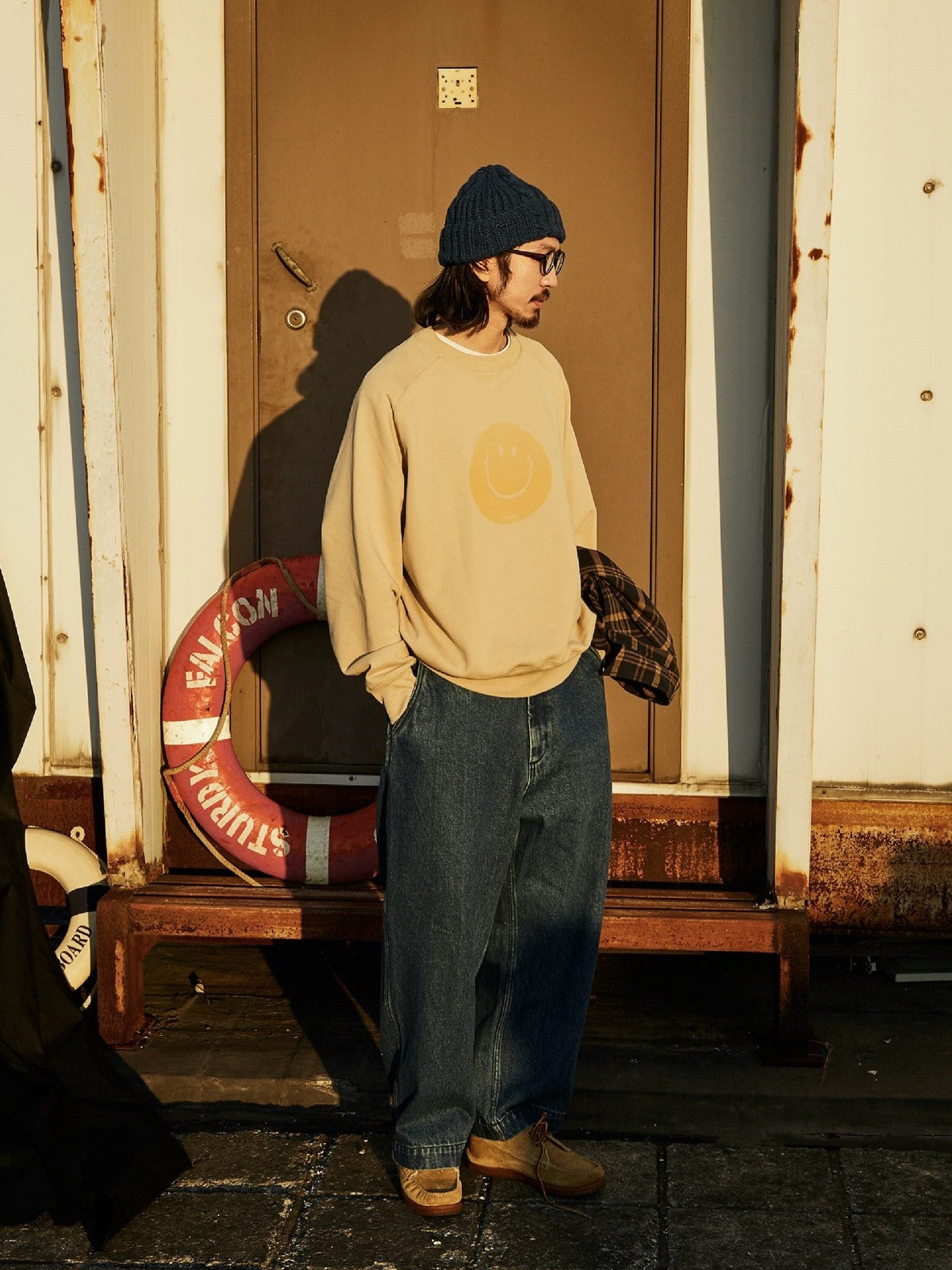 USAGE Washed Cotton Raglan Smiley Sweatshirt in Beige - On Male Model