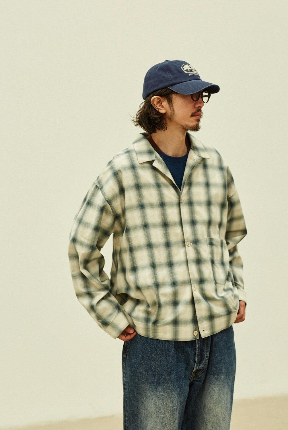 USAGE Gradient Plaid Cotton Blouson in Off-White - On Male Model