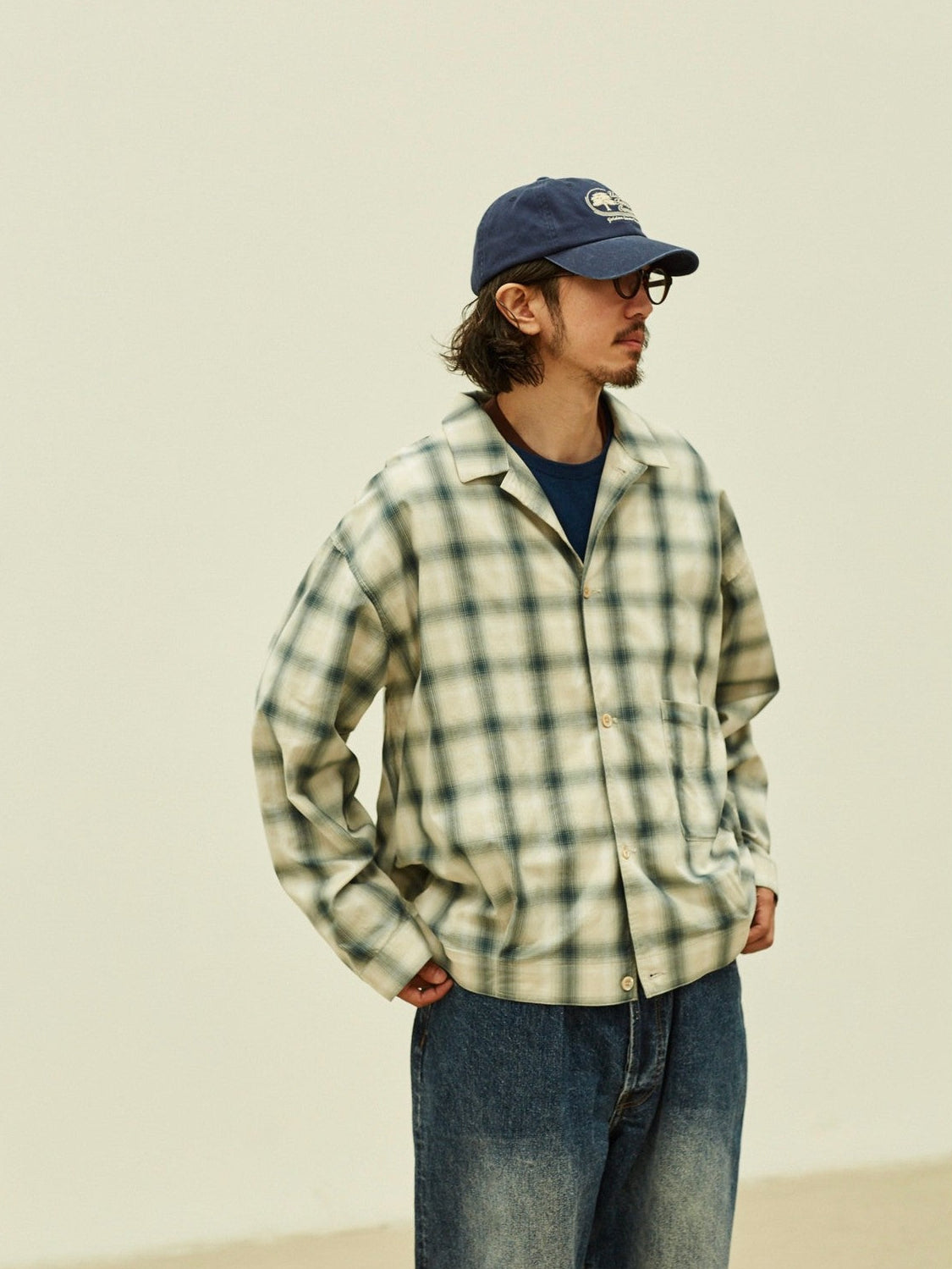 USAGE Gradient Plaid Cotton Blouson in Off-White - On Male Model