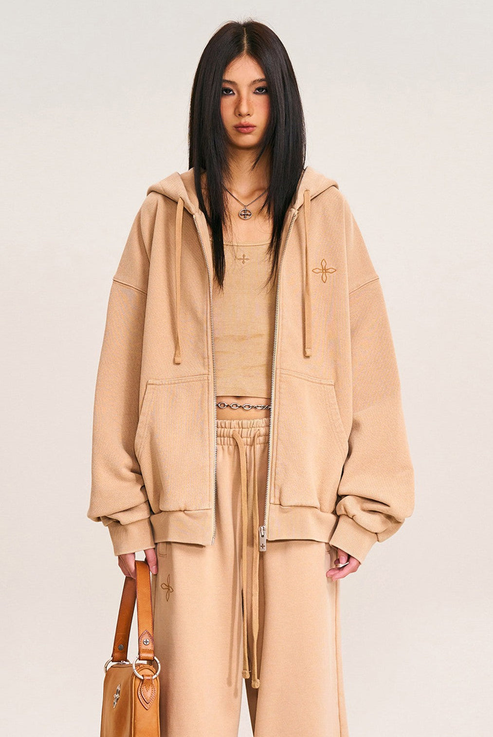 SMFK Cross Embroidered Cotton Zip Up Hoodie in Beige - On Female Model
