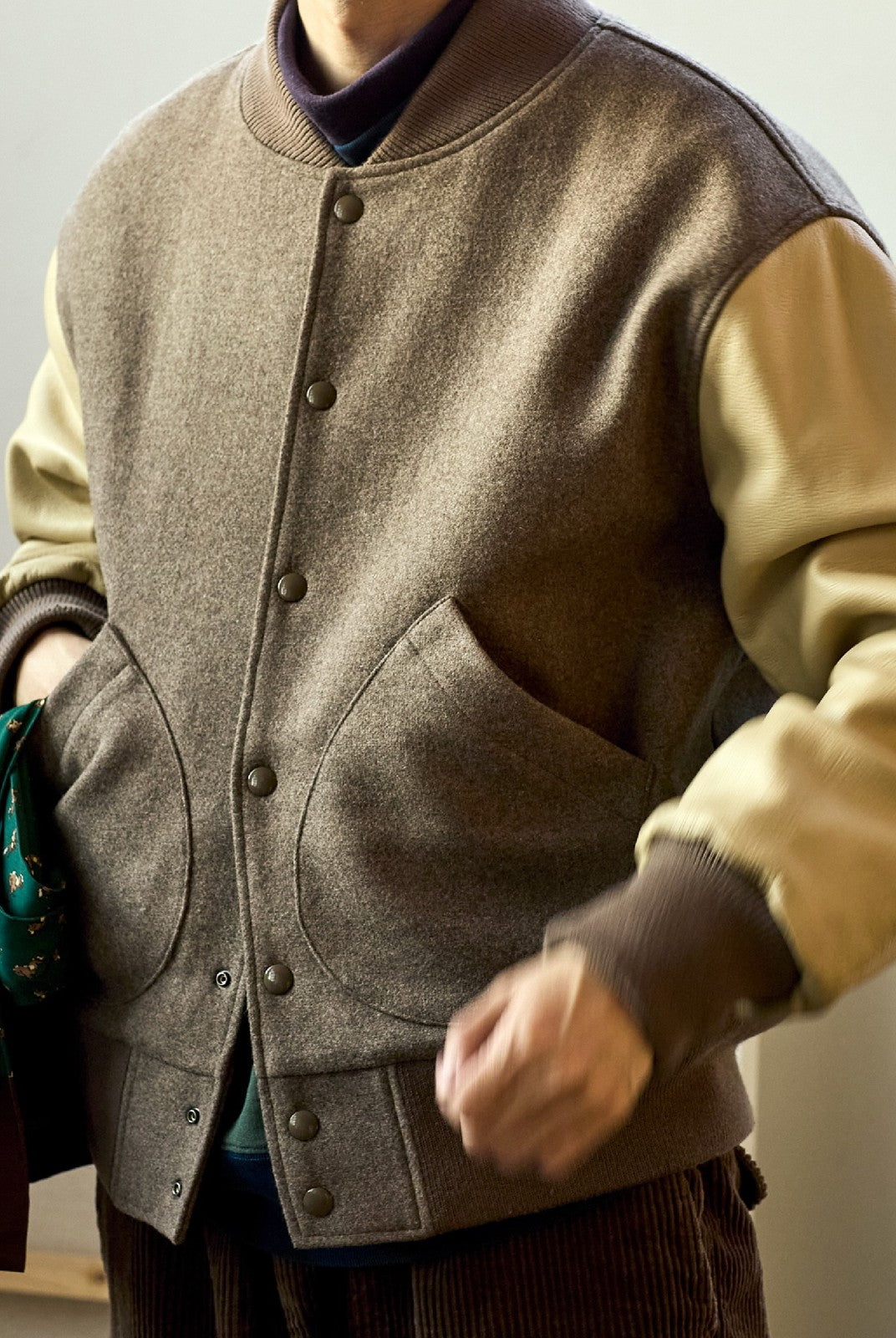 USAGE Reversible Velvet Leather Varsity Jacket in Beige - On Male Model