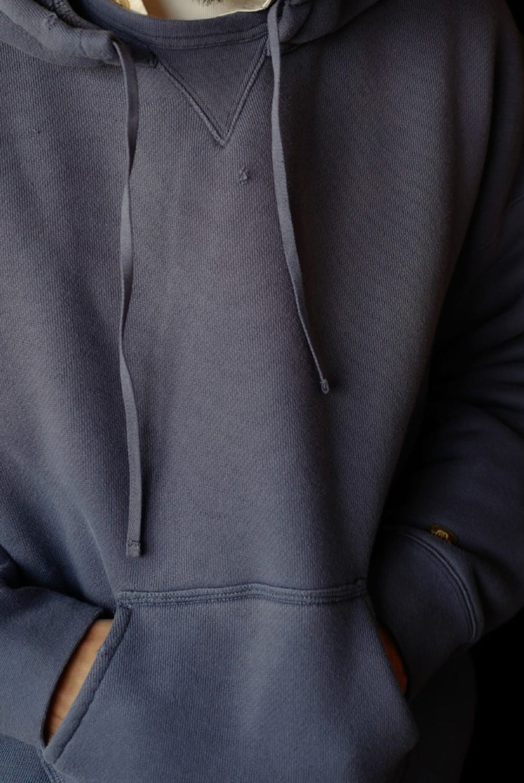 USAGE Faded Vintage Wash Hoodie in Blue - On Male Model