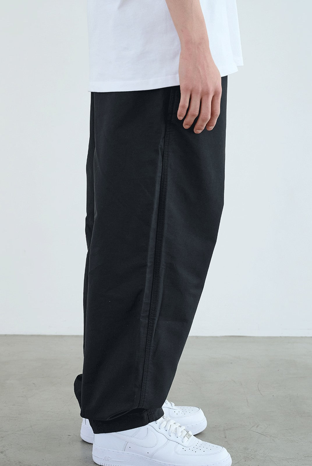 SOD Belted Cotton Nylon Tapered Pants in Black - On Model