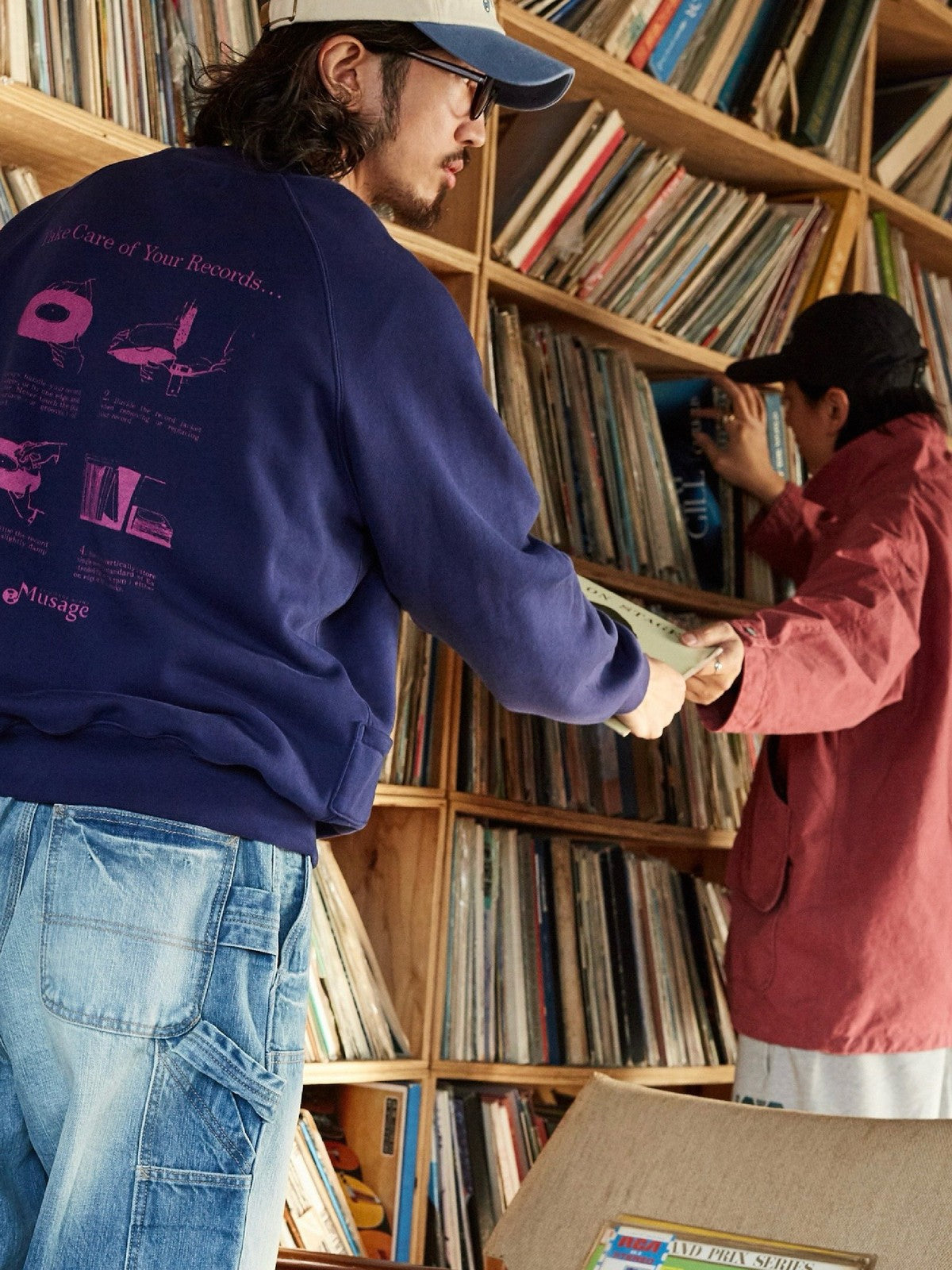 USAGE Heavyweight Raglan Graphic Sweatshirt in Navy Blue - On Male Model
