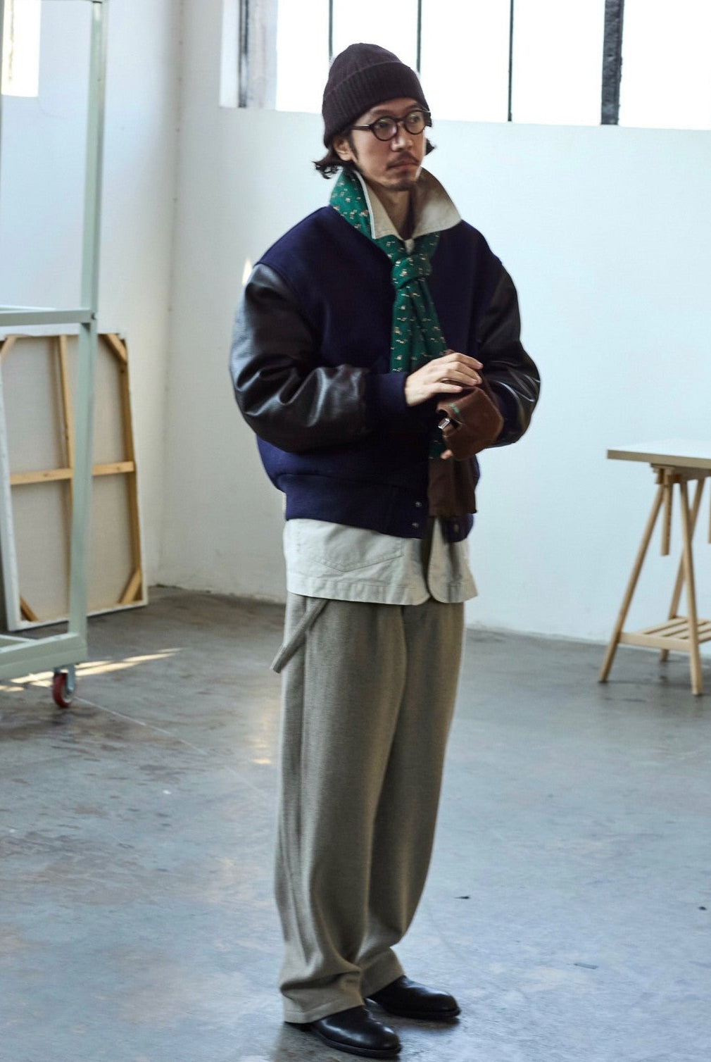 USAGE Reversible Velvet Leather Varsity Jacket in Navy Blue - On Male Model