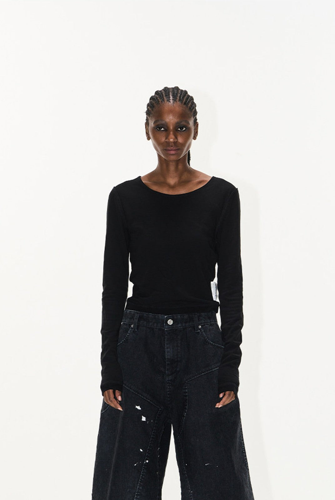 BLINDNOPLAN Ink Splatter Denim Carpenter Shorts in Black - On Female Model