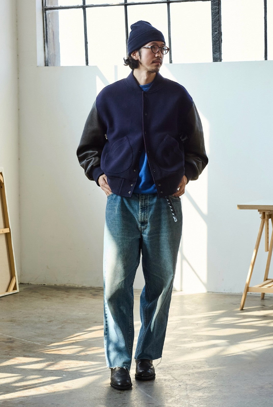 USAGE Reversible Velvet Leather Varsity Jacket in Navy Blue - On Male Model