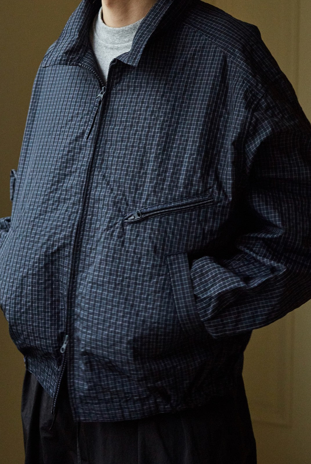 USAGE Jacquard Check Harrington Jacket in Navy Blue - On Male Model