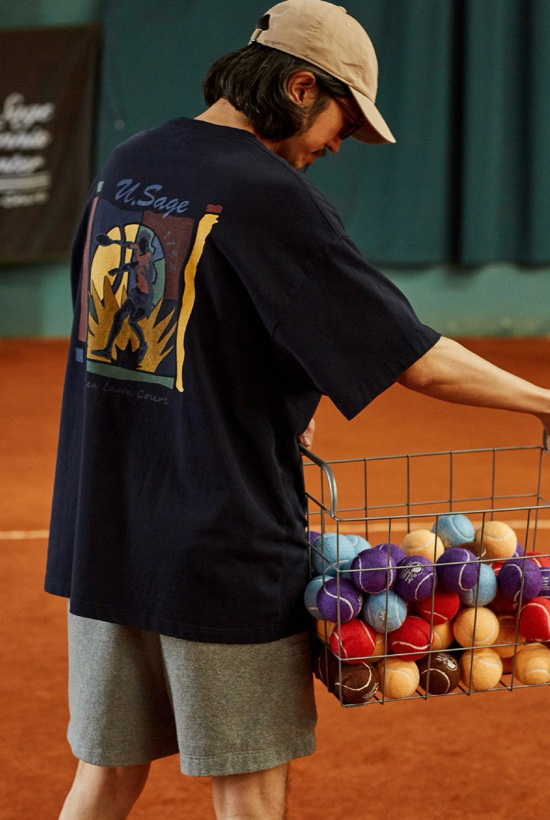 USAGE Retro Tennis Graphic Cotton T Shirt in Navy Blue - On Male Model