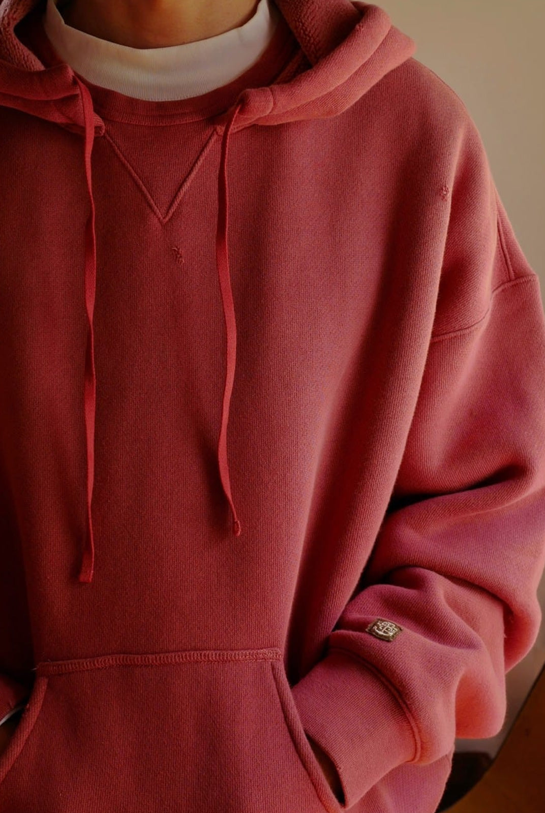 USAGE Faded Vintage Wash Hoodie in Red - On Male Model