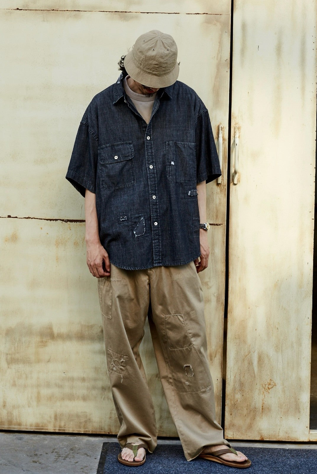 USAGE Distressed Short Sleeve Denim Shirt in Gray - On Male Model