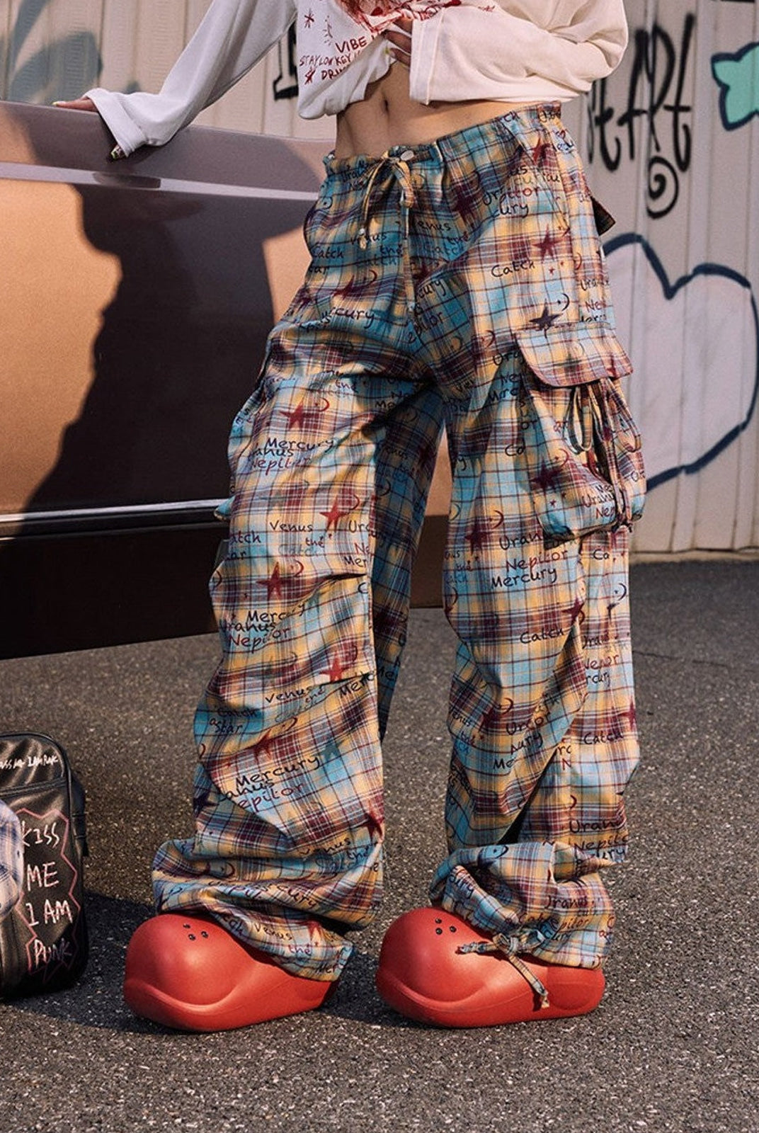 BeerBro Graffiti Plaid Strap Cargo Pants in Sky Blue - On Female Model