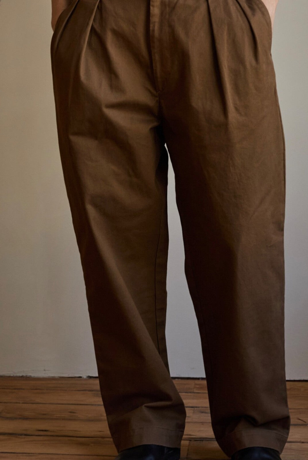 USAGE Pleated Cotton Twill Chinos in Beige - On Model
