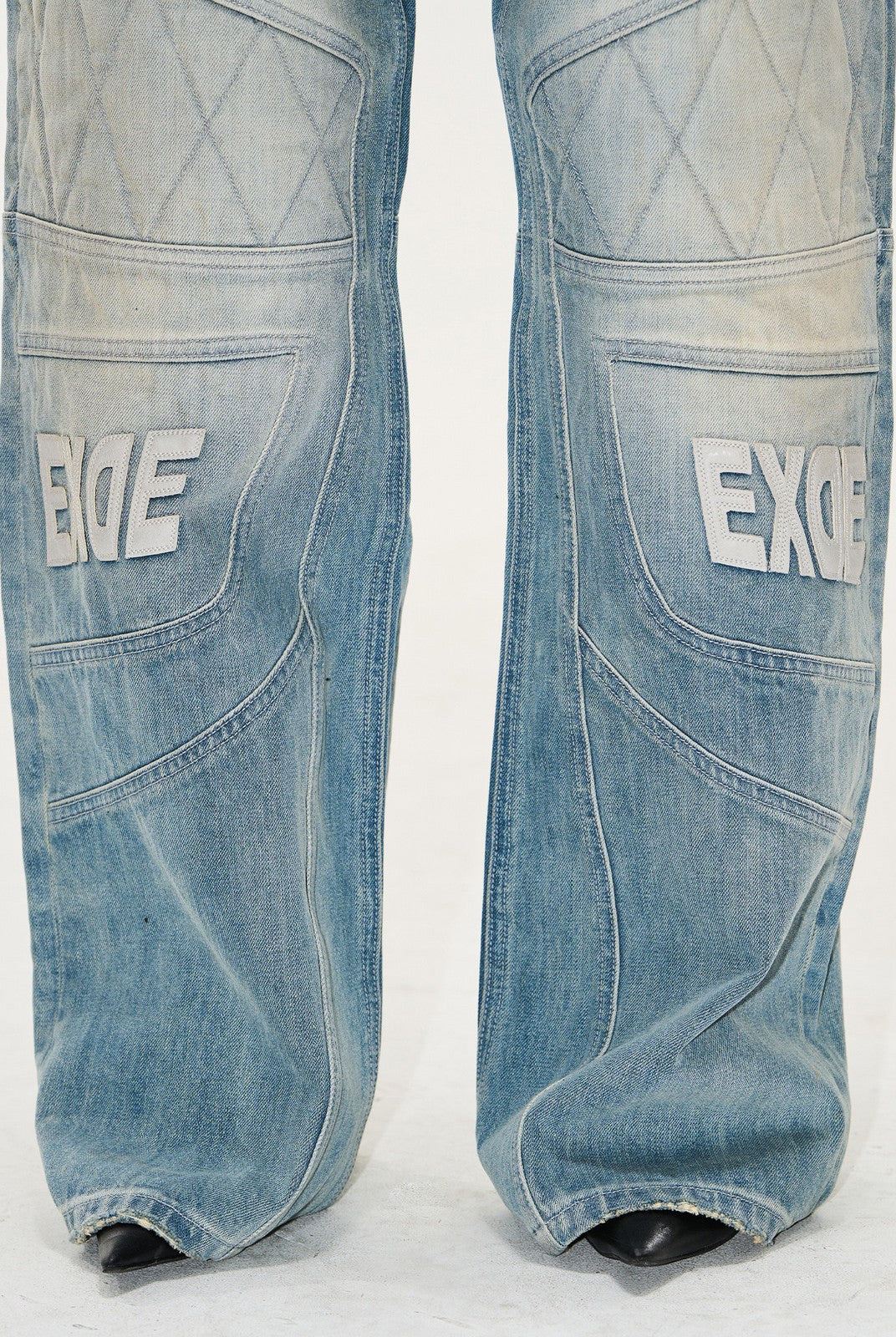 BLINDNOPLAN Paneled Embroidered Distressed Denim Pants in Blue - On Model