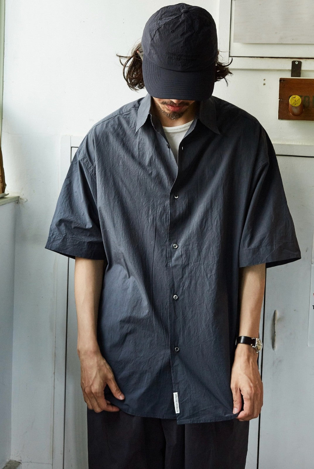 USAGE Cotton Crinkle Short Sleeve Shirt in Navy Blue - On Male Model