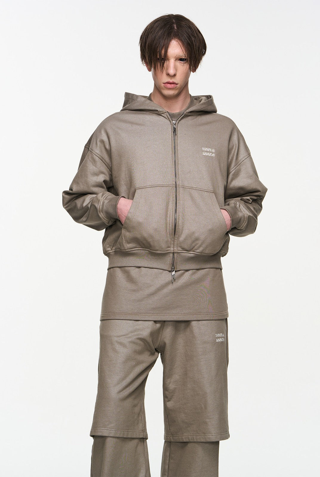 BLINDNOPLAN Metallic Logo Zip Hoodie Pants Set in Beige - On Male Model