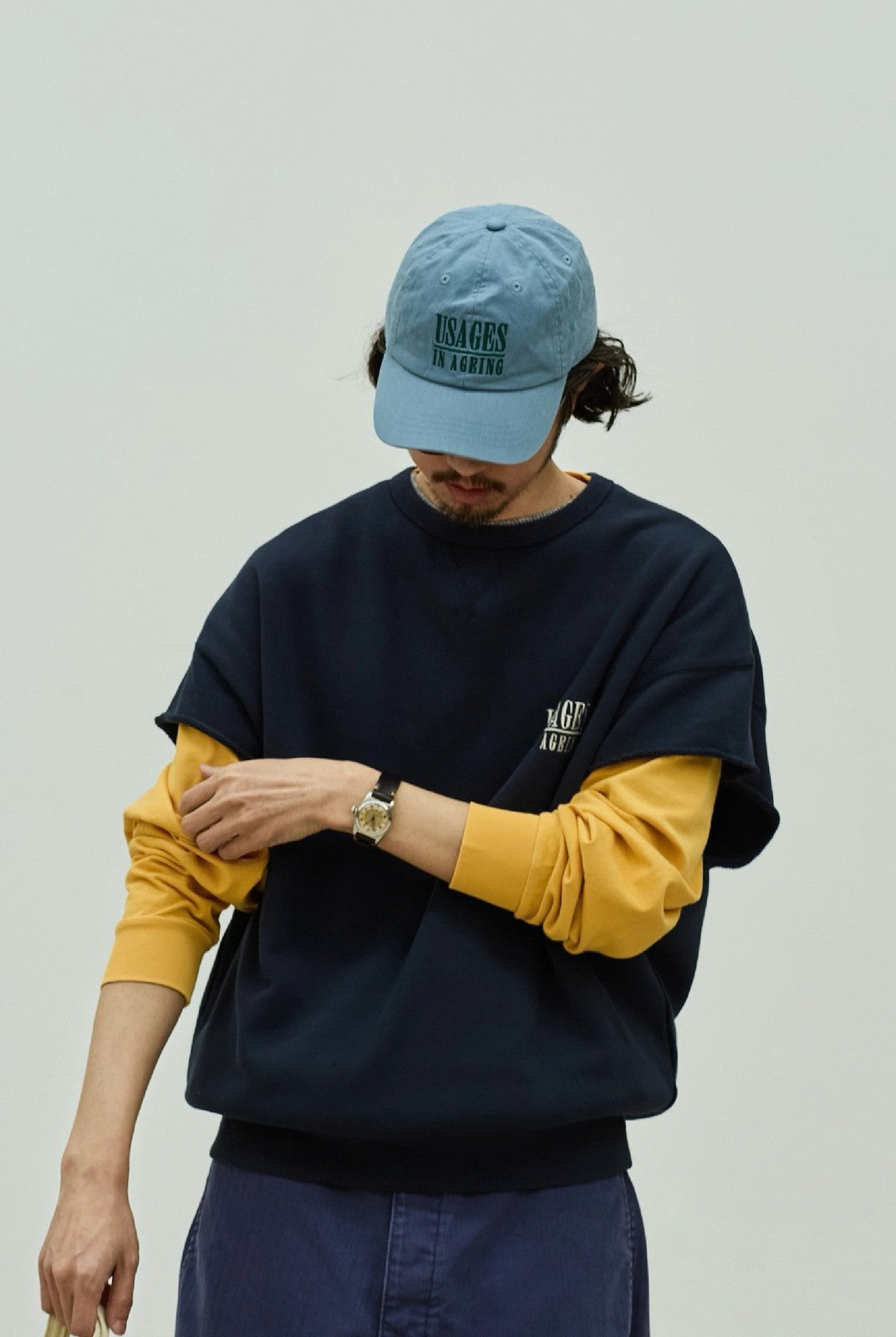 USAGE Raw Edge Cotton Short Sleeve Sweatshirt in Navy Blue - On Male Model