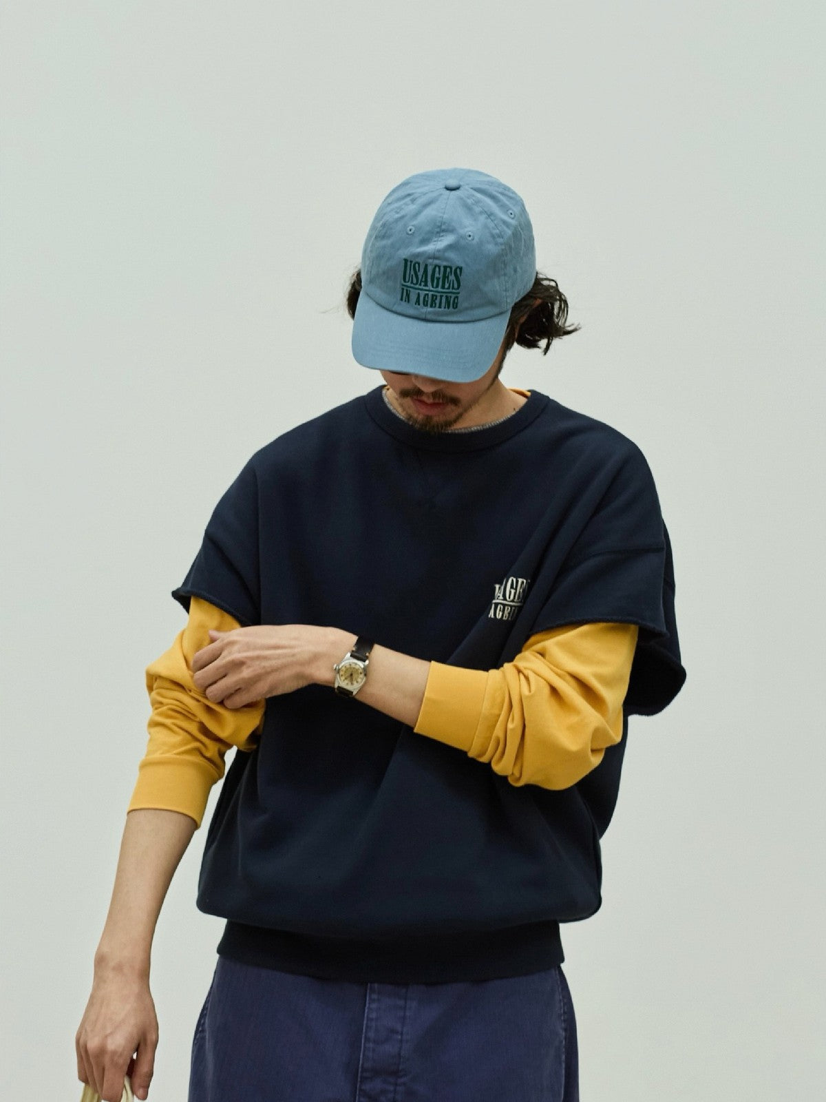 USAGE Raw Edge Cotton Short Sleeve Sweatshirt in Navy Blue - On Male Model